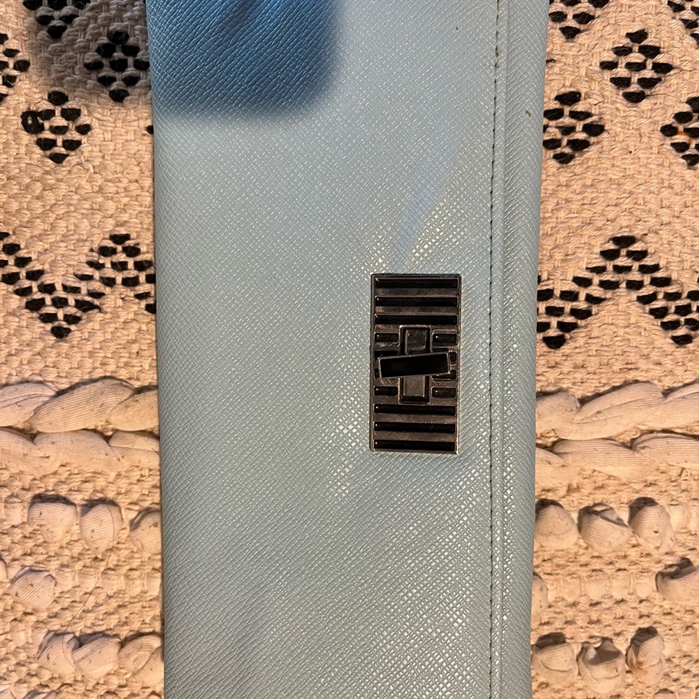 Gently used, light blue leather wallet